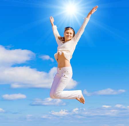 energised-woman-jumping-in-the-air