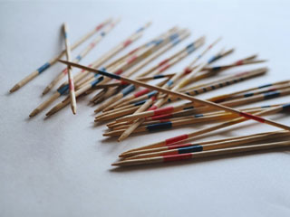 coloured tipped pick-up sticks kids game